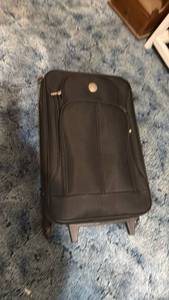 lot 1202 image: Travelers Club carry on luggage