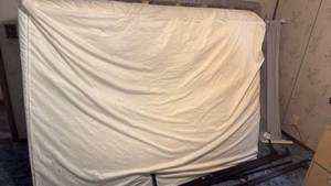 lot 1212 image: Kooldoo bed rail, queen box springs, mattress with protective cover and frame