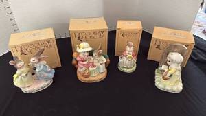 lot 1335 image: Avon Precious Moments with boxes