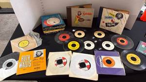 lot 1342 image: Assorted 45s records and cassette