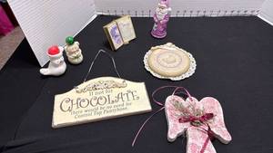 lot 1379 image: Chocolate sign, angle and ornament
