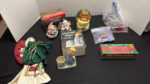 lot 1383 image: Towel angel, Snowmen salt and pepper shakers, Angel globe, clear lights and ornament hooks