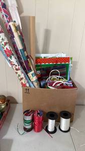 lot 1385 image: Wrapping paper, gift bags and ribbon