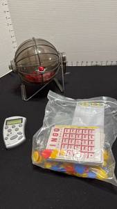 lot 1393 image: Bingo tumbler, cards and chips