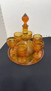 lot 1401 image: Indiana Glass Tiara amber sandwich glass tray, decanter and 6 stemmed glasses
