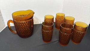 lot 1404 image: Indiana Glass Tiara Amber Diamond Point pitcher and 6 glasses