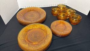 lot 1406 image: Indiana Glass Tiara Amber Sandwich glass plates and cups 20 pc total, please bring packing material and boxes