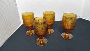 lot 1407 image: Indiana Glass Tiara Amber Sandwich glass footed goblets