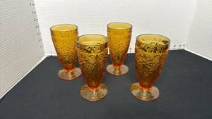 lot 1408 image: Indiana Glass Tiara Amber Sandwich glass footed glasses