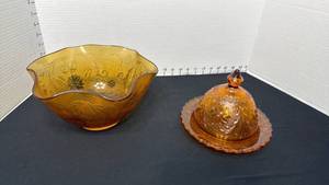lot 1409 image: Indiana Glass Tiara Amber Sandwich glass ruffled bowl and covered butter dish