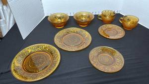 lot 1412 image: Indiana Glass Tiara Amber Sandwich glass plates, bowls and cups
