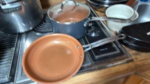 lot 1469 image: Copper Chef and Gotham pans and trivets