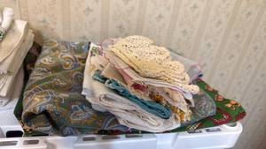 lot 1921 image: Aprons and embroidered pillowcase and doilies