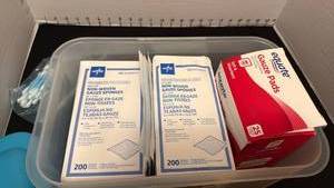 lot 1950 image: Gauze pads in plastic container