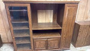 lot 2002 image: Entertainment cabinet 52x59x20 located in basement