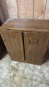 lot 2003 image: Video cabinet 30x24x12 located in basement