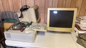 lot 2007 image: Axcel 100 by Packard Bell tower, 2 monitors and keyboard located in basement
