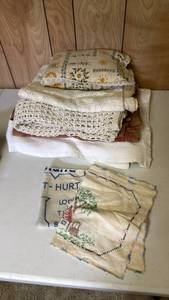 lot 2009 image: Tablecloths and embroidered towel and more located in basement