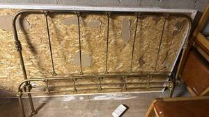lot 2103 image: Full size iron headboard, footboard and 2 rails located in basement