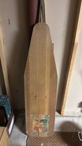 lot 2106 image: Wood ironing board located in basement