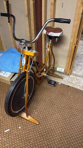 lot 2111 image: Schwinn exercise bicycle located in basement