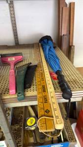 lot 3025 image: Ice scrapers, umbrella and yard sticks