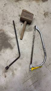 lot 3040 image: Bow saw, lug wrench and wood mallet