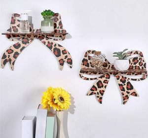 lot 17071 image: 2pcs Leopard Bow Butterfly Wall Shelves Leopard Bowknot Wall Mounted Storage Shelf Wood Hanging Decorative Racks for Kitchen Bathroom Office Home Decor Crystal Stone Display - Retail $22