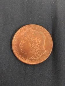 lot 61551 image: 1-ounce Morgan Dollar copper round