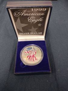 lot 61581 image: 1999 American Eagle colorized silver dollar