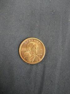 lot 61583 image: 2004 United States Sacagawea Golden Dollar coin