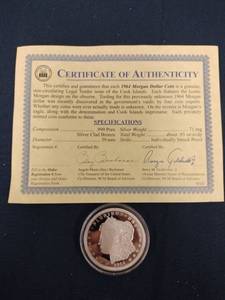 lot 61591 image: 1964 Morgan Dollar replica coin