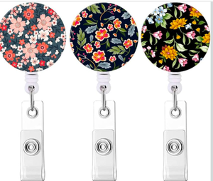 lot 1161 image: Floral Pattern Badge Reel Retractable ID Holder Set - 3 ct