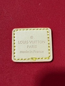 lot 25151 image: Brown Lvl5 replica Etui Voyage MM pouch with red interior lining