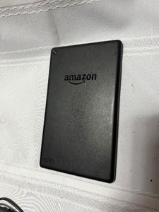 lot 26700 image: Amazon Tablet w Cords