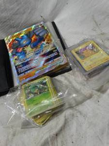 lot 26664 image: Pokmon Cards, Binder, & Card Binder