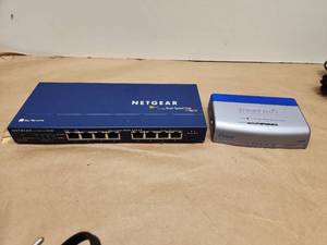lot 31 image: Netgear DS108 Dual Speed Hub and Hawking HFS8T Ethernet Switch Bundle with Power Adapters