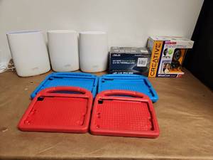 lot 34 image: Netgear Orbi 3-Pack Mesh WiFi System with ASUS GX1005B Ethernet Switch, Creative WebCam Live, and Kids Tablet Cases