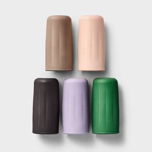 lot 102 image: Silicone Bottle Caps, set of 4 Multicolored Travel Luggage Accessories - Retail $7
