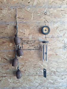 lot 60 image: Tractor Tire Wind Chime & Vintage Bells