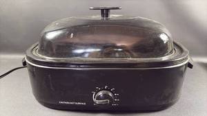 lot 65 image: Walmart Brand 18 inch Electric Turkey Roaster with Lift Rack- Heats up Quick