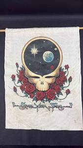lot 79 image: 1992 Liquid Blue Grateful Dead Space Your Face White Wall Hanging 14 by 19 Inches