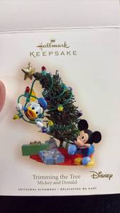 lot 84 image: Hallmark Keepsake Disney Trimming the Tree Mickey and Donald Christmas Ornament