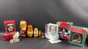 lot 86 image: Christmas Ornament and Collectibles Lot - Hallmark Keepsake, Precious Moments, Nesting Dolls & More