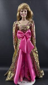 lot 90 image: Nolan Miller Vanna White Porcelain Doll