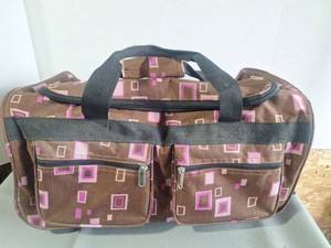 lot 115 image: Brown & Pink Geometric Print Rolling Duffel Bag