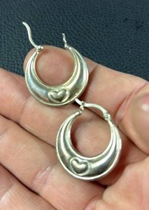 lot 16 image: 9.25 Puff Hoop Earrings with Heart Detailing.