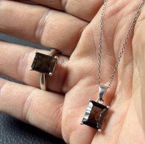 lot 46 image: Sterling Silver and Smoky Quartz Ring and Necklace Set