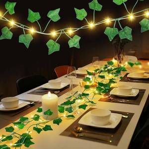lot 1815 image: 6.56FT Battery Powered(Pre-Installed) Leaf String Lights with Auto Timer, Fake Vines with Fairy Lights, 3 Lights Modes Fake Plant Light, Ivy Light for Wedding Decor, Home Decorations (4 Pack)