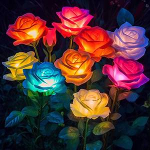 lot 19556 image: Solar Lights Outdoor Waterproof for Garden Decor, 4 Pack Solar Garden Lights for Outside, Outdoor Solar Lights for Yard with Solar Flowers Lights, Solar Powered Yard Decorations - Retail $21
